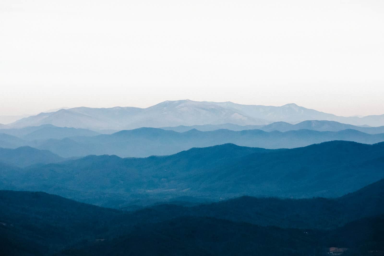 Layered blue ridgelines fading into haze, the classic Blue Ridge mountain view